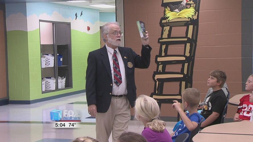 Rotary Club donates dictionaries to St. Marys 3rd graders 2.jpg