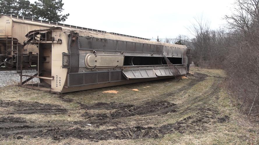 Two train cars carrying corn derailed Wednesday night