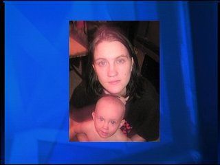 Murdered woman's child removed from home