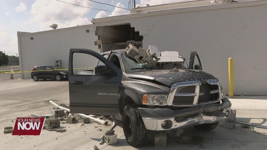 Pickup driver hits Lima strip mall while he is being assaulted