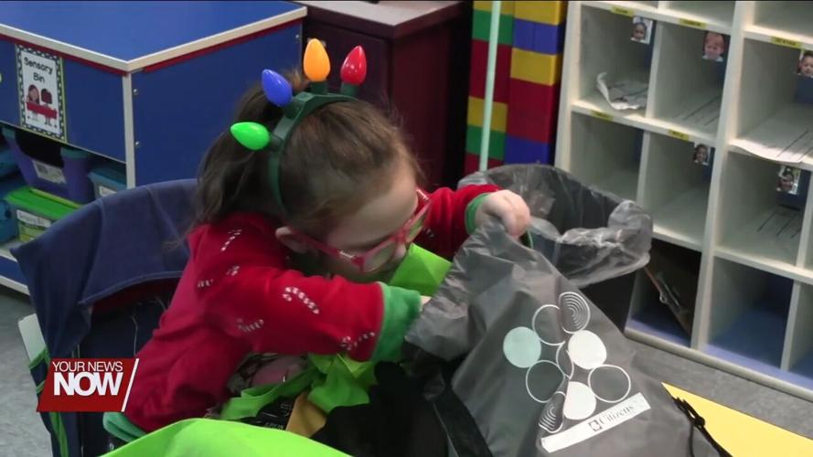 Lima Exchange Club brings Christmas gifts to Freedom Elementary students