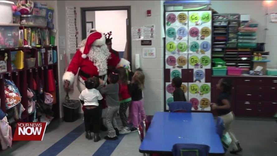 Lima Exchange Club brings Christmas gifts to Freedom Elementary students