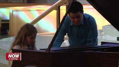 LSO guest soloist gives St. Charles students a lesson on the piano