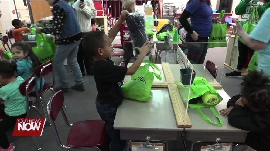 Lima Exchange Club brings Christmas gifts to Freedom Elementary students