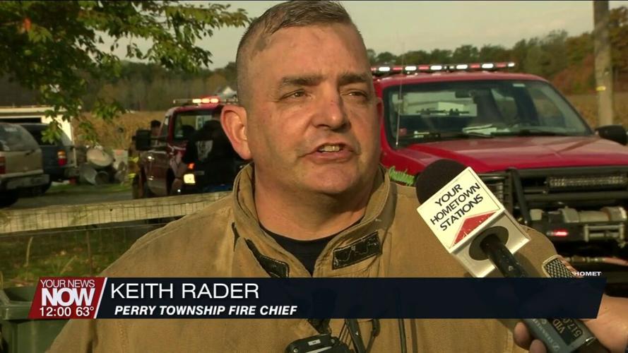 Multiple fire crews assist with fire after a vehicle crashes into a Perry Township home