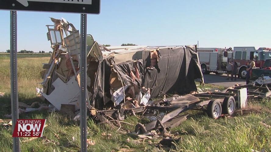 Pickup truck pulling a camper rear-ended by a semi on U.S. 30