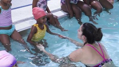Heir Force Community School partners with YMCA for student swim lessons