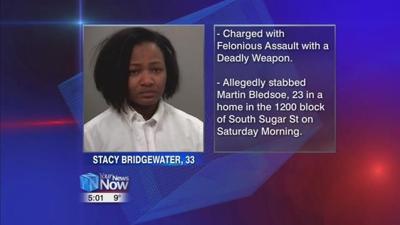 Lima woman charged after stabbing a man with knife