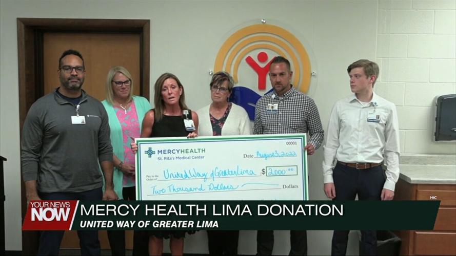 Mercy Health donates check to the United Way to assist with the purchase of school supplies