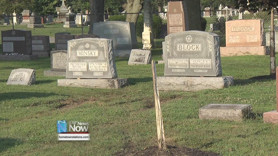 Hit-skip accident damages fence and gravestones at Gethsemani Cemetery 1.jpg