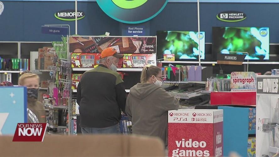 Black Friday crowds shrink as COVID-19 cases grow