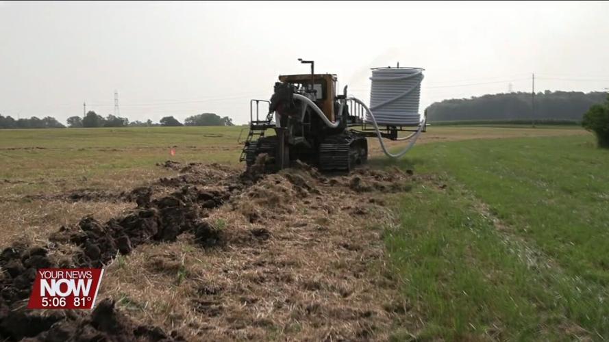 Farmers get a chance to see technological advances in the installation of drain tile at Ohio State Lima