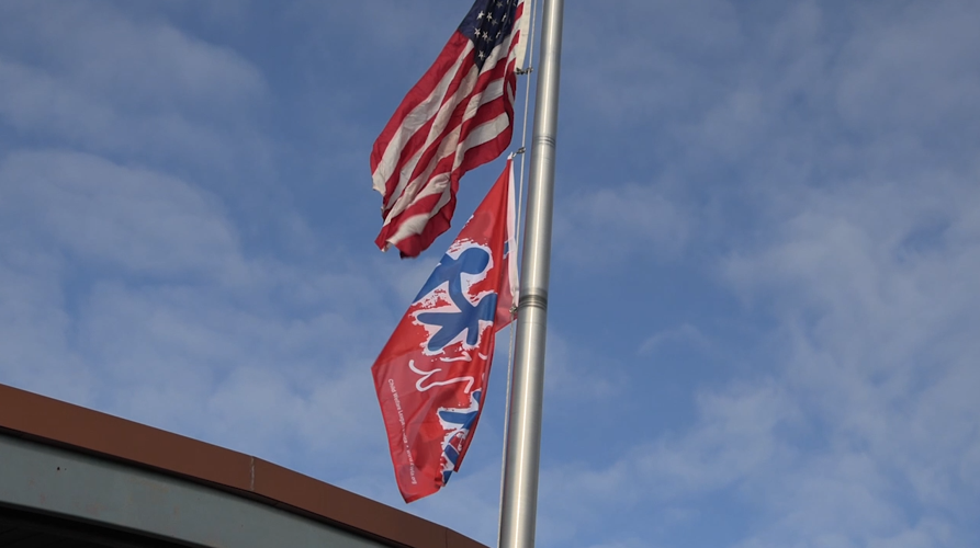 Flag-raising ceremony honors victims, calls for action against child abuse