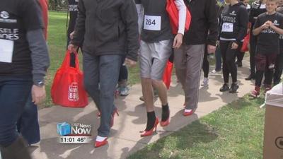 Walking a mile in her shoes in Hancock County