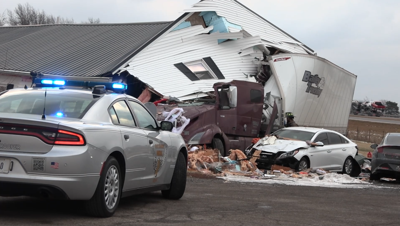 Semi truck crashes into Beaverdam home, sending three to hospital