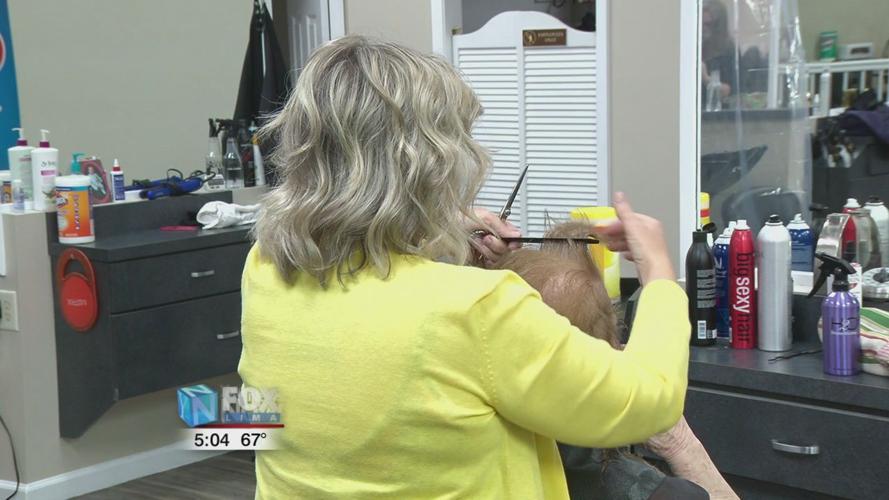 Barbershops and salons reopen under strict guidelines