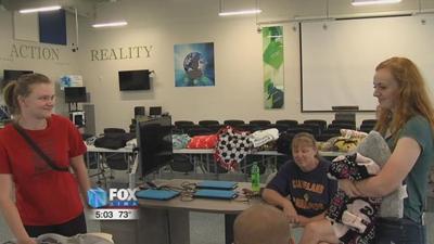 Initially told they were gone, students receive items from bus crash