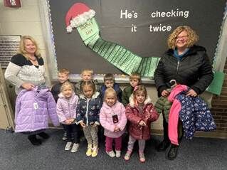 125+ coats, shoeboxes, and care items donated by Paulding Putnam Electric Cooperative for holidays