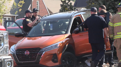 Driver crashes into tree at Superior Credit Union, causes minor damage