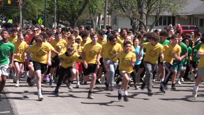 Lima Catholic students promote positivity during 42nd annual run