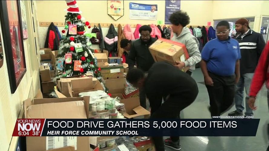 Heir Force Community School students making a positive impact in the community with food drive donation