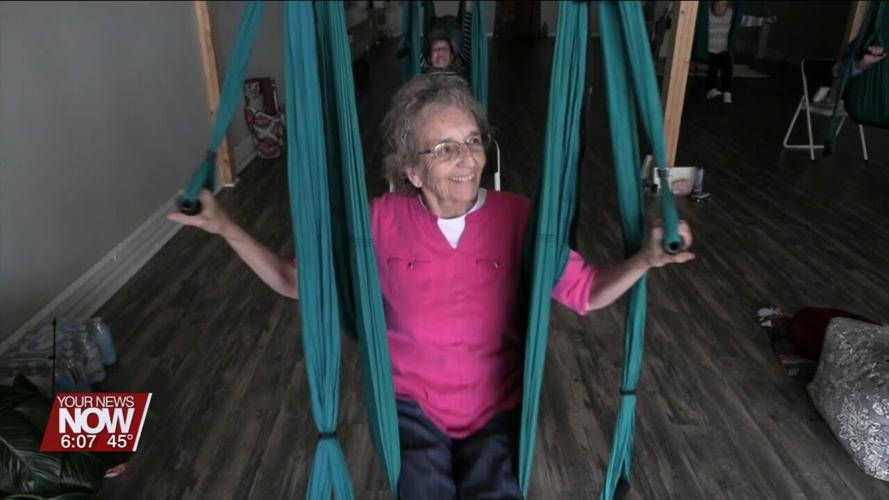 Seniors from Otterbein Cridersville get a chance to try out aerial yoga in Wapakoneta