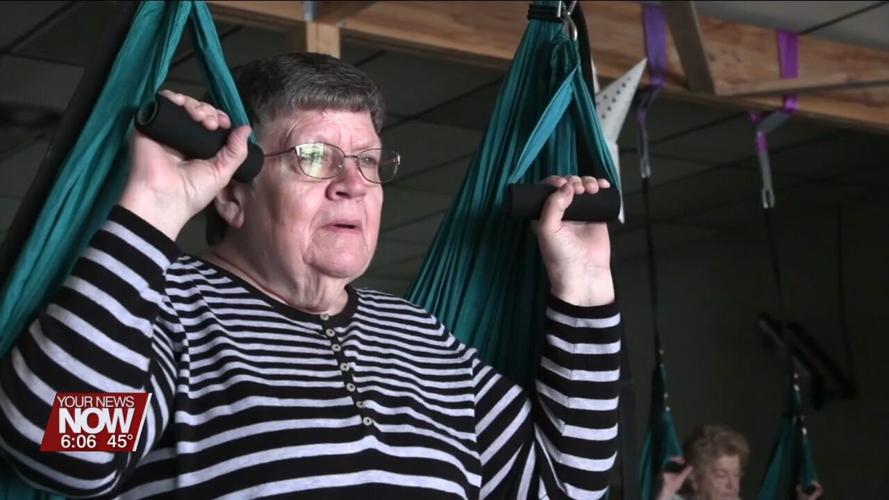 Seniors from Otterbein Cridersville get a chance to try out aerial yoga in Wapakoneta