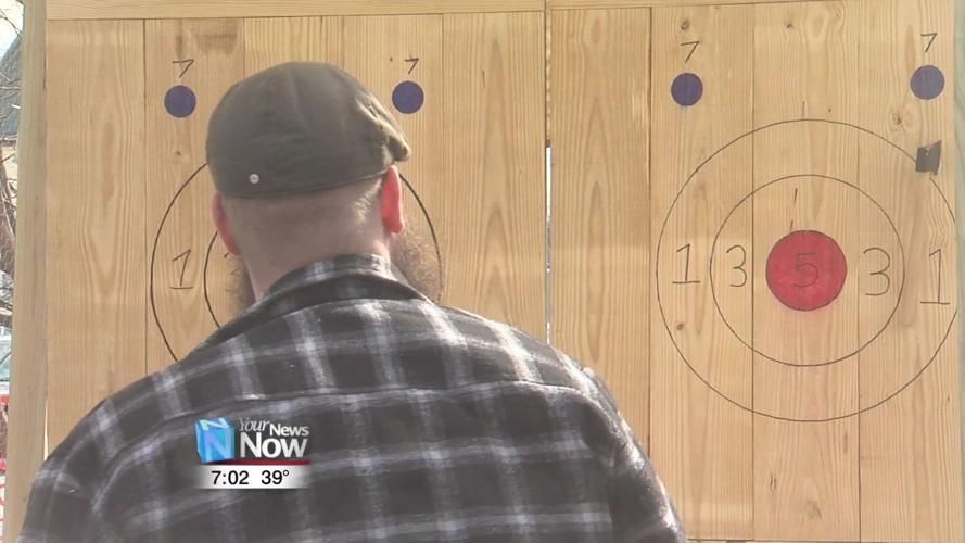 Mulligans customers celebrate St. Patrick's Day weekend with axe-throwing.jpg