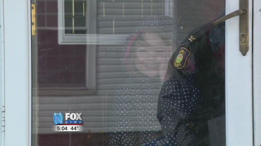 Lima Police Department joins the Easter Bunny for early Easter deliveries