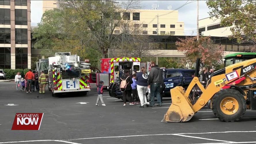 A local library hosted a Touch-A-Truck event for families and individuals of all ages to enjoy