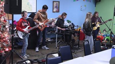 Minor Blues Youth Band performs rock classics during lunch service at Our Daily Bread