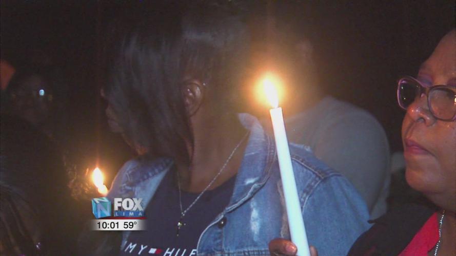 Family and friends hold a prayer vigil for Gregory Cooper