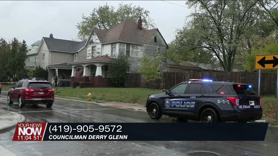 Lima city councilman Derry Glenn distributing cards about how to act when pulled over by police
