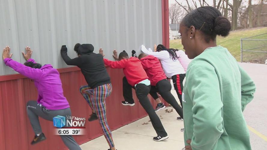 Local track team gets a special visit from two-time NCAA champion
