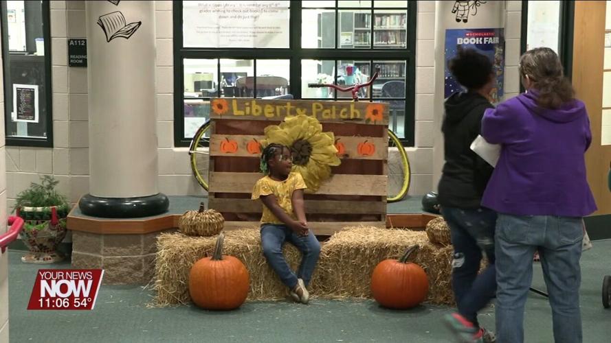 Liberty Arts Magnet School families check out students' progress and enjoy fun activities at Fall Carnival