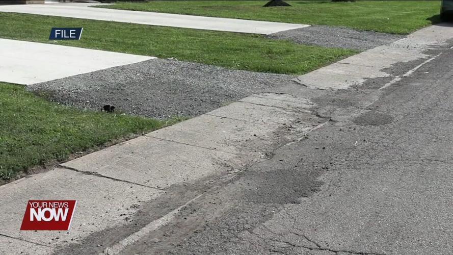 Residents and city officials discuss the Catalpa and Holmes Reconstruction Project