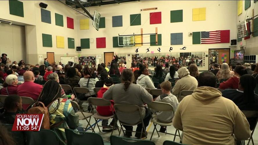 Liberty Arts Magnet School families check out students' progress and enjoy fun activities at Fall Carnival