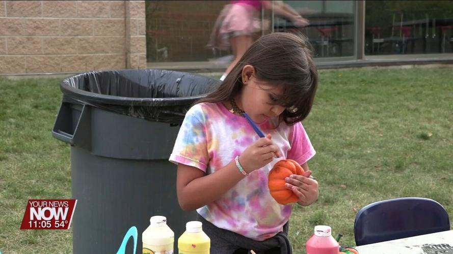 Liberty Arts Magnet School families check out students' progress and enjoy fun activities at Fall Carnival