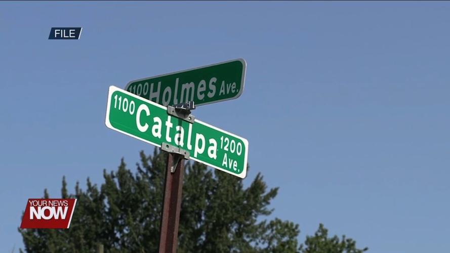 Residents and city officials discuss the Catalpa and Holmes Reconstruction Project