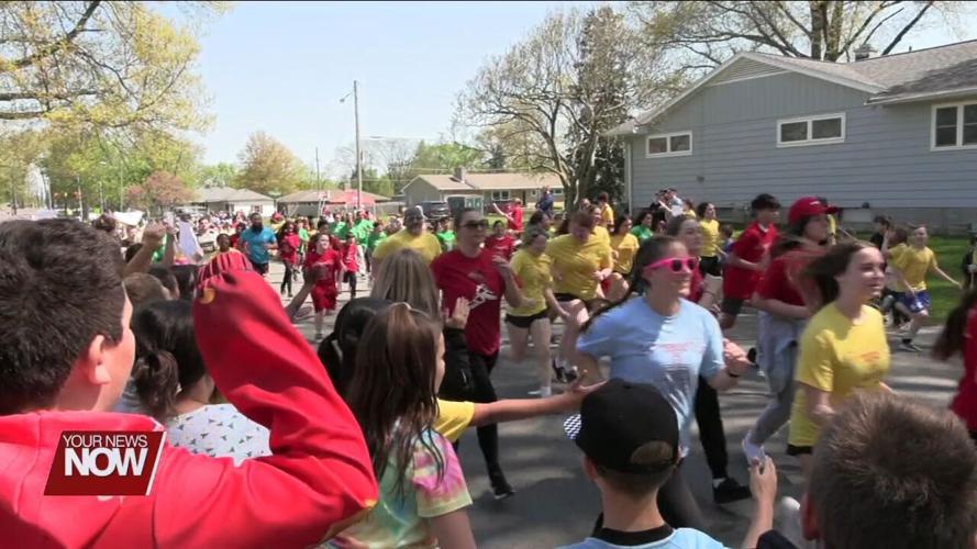 Lima Catholic School students finish Positive Addiction Week with a message from certified life coach Julie Wilkes and the annual 5K