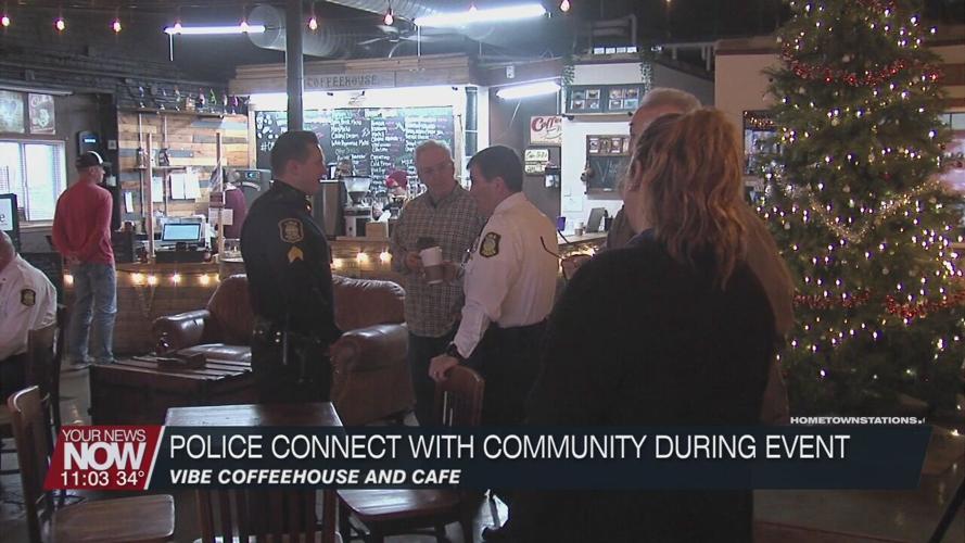Lima residents share cups of coffee with police officers at Vibe Coffeehouse