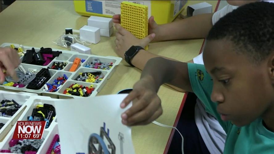Kids work on collaborative and STEM skills with the Lego program at Lima YMCA