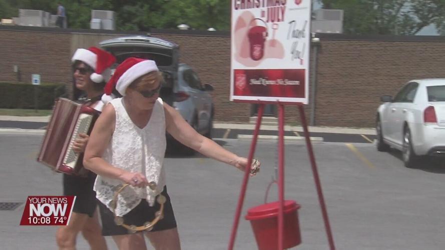 Forget "bell ringing"--this duo put on a show for the Salvation Army's Christmas in July