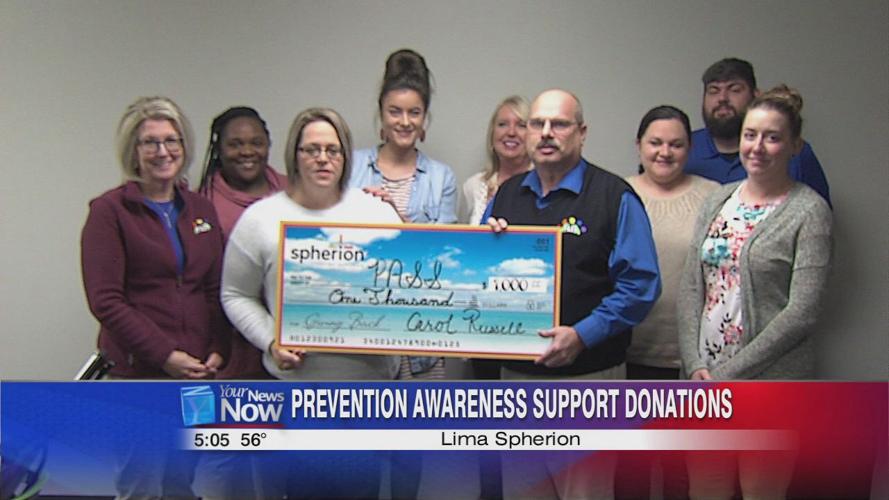 Lima Spherion office donates $1000 to PASS.jpg
