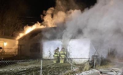 Combustible materials touching wood stove pipe blamed for structure fire in Lima