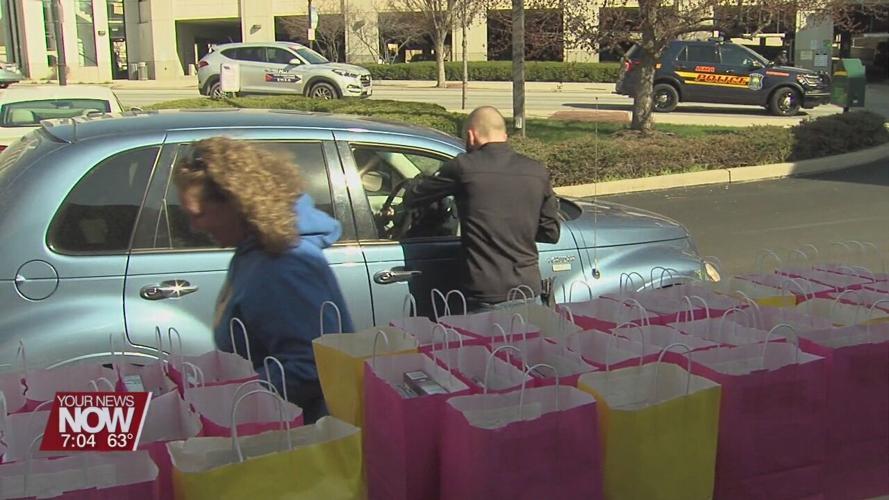 Tom Ahl Dealership holds drive-thru Easter dinners