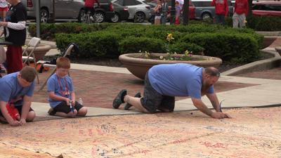 Lima residents sign “We the People” banner on Memorial Day