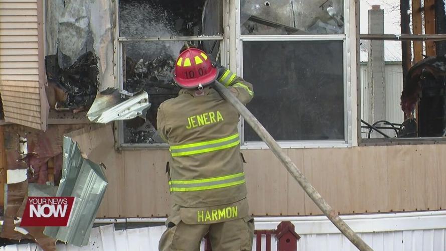 Fire destroys a mobile home and damages another