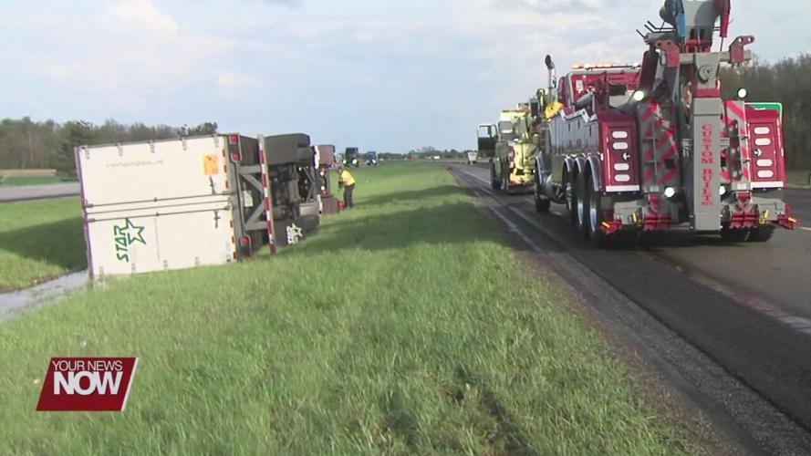 Tuesday storm topples semi and downs power poles causing scattered outages