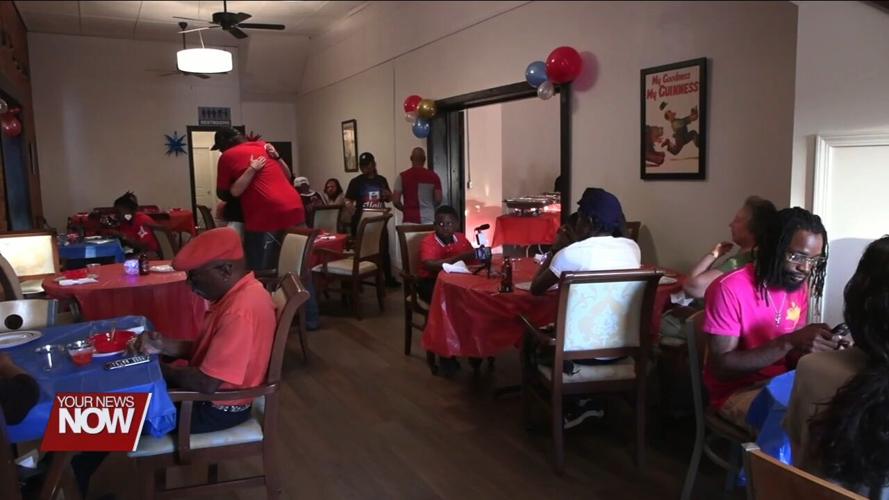 Lima residents taste test culture at celebration of Haitian Flag Day